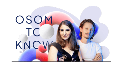 A woman and a man standing together in front of an abstract background with colorful shapes. The text "OSOM TO KNOW" is partially visible behind them.