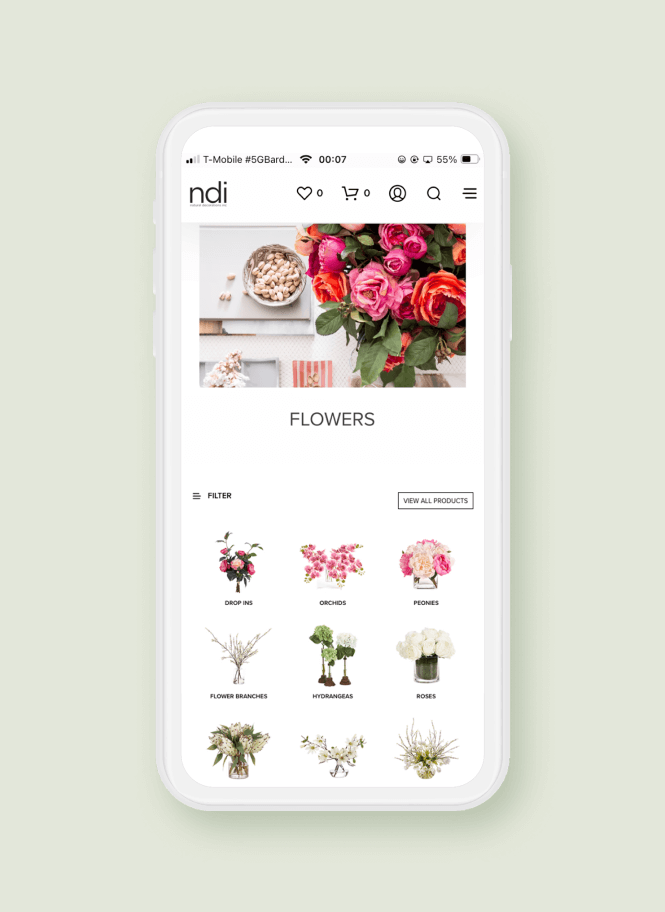A smartphone display shows a flower shopping app powered by e-commerce. The screen features a top banner with a floral bouquet and options to buy orchids, peonies, and roses. Convenient filter and view buttons enhance the shopping experience.